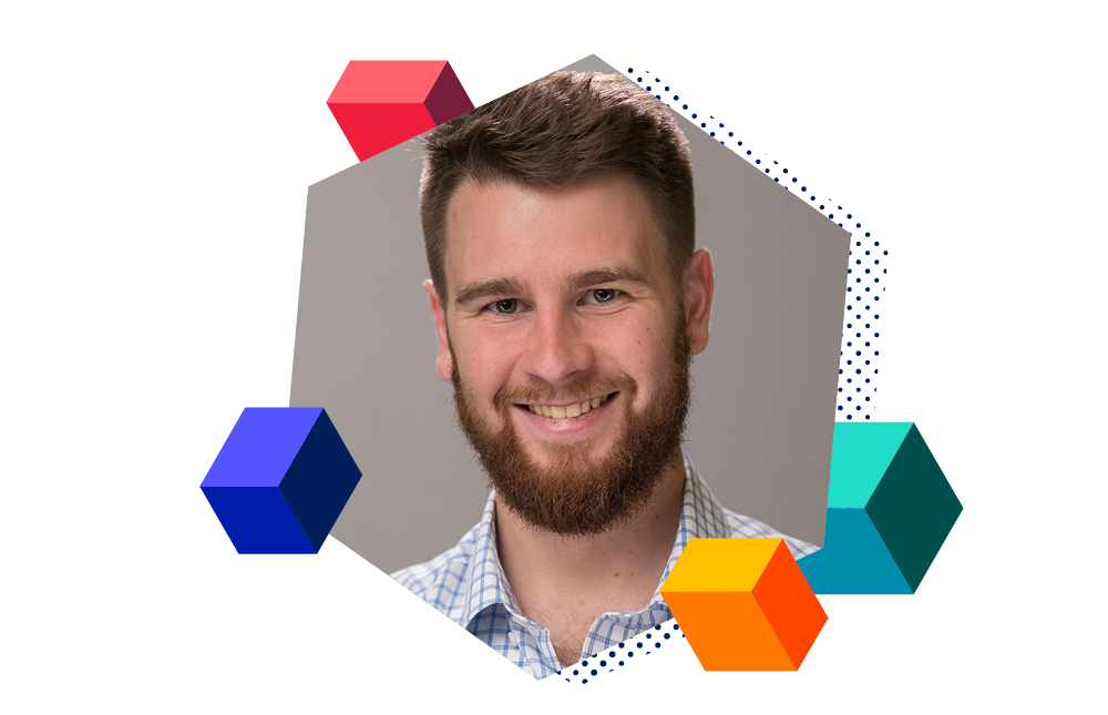 Headshot of Christopher Mitchell surrounded by decorative blocks