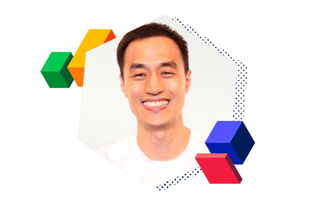 Headshot of David Cheng surrounded by decorative blocks